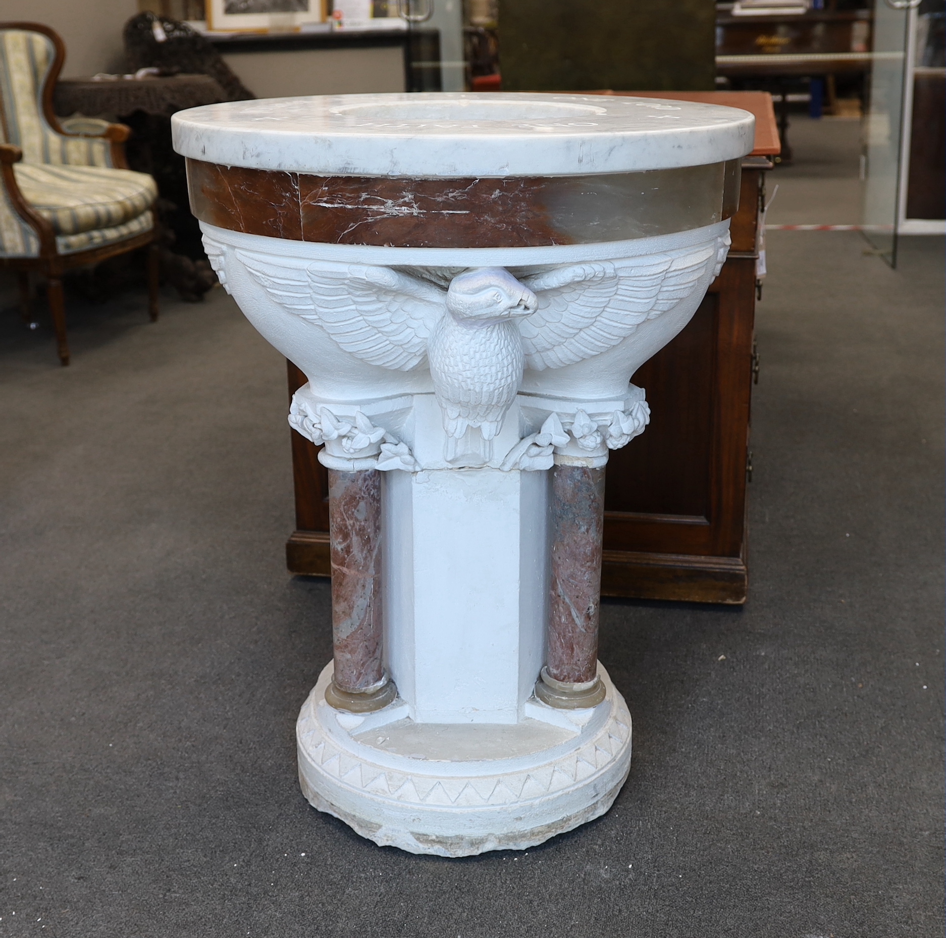 A Victorian carved rouge marble font, top engraved 'One Faith One Baptism One Lord', diameter 68cm, height 89cm